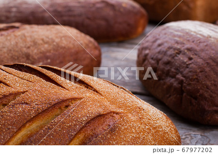 Fresh crusty artisan bread. 67977202