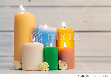 home lighting candles on wooden table. creative photo. 67978540