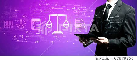 Legal advice service concept with businessman using his tablet Legal advice service concept with businessman using his tablet 67979850