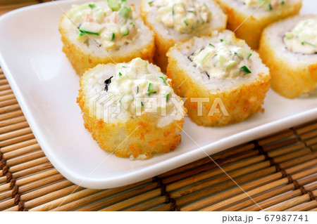 tempura Maki sushi rolls with cream cheese, on a tempura Maki sushi rolls with cream cheese, on a 67987741