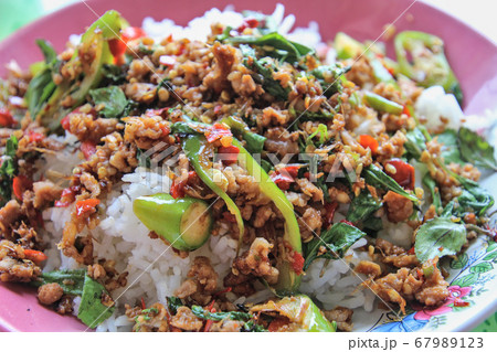 Stir fried minced pork with basil is the food that Thai people like to eat the most. Stir fried minced pork with basil is the food that Thai people like to eat the most. 67989123