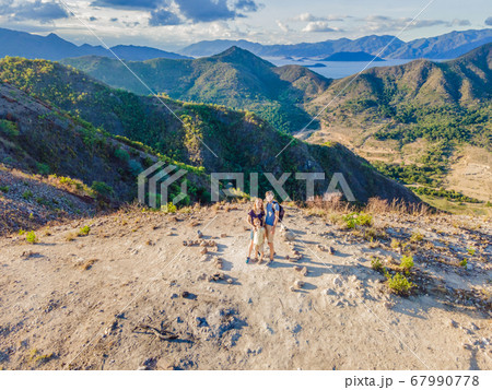 A family of local tourists goes on a local hike during quarantine COVID 19 A family of local tourists goes on a local hike during quarantine COVID 19 67990778