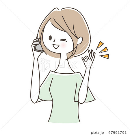 スマホで話しながらOKサインを出す女性 67991791