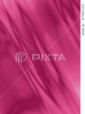 Bright satin background with wavy folds of crimson and pink stripes lying at an angle 67992192