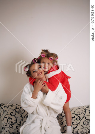 Emotions. Happy loving family. Mother and daughter spend time together at home. 67993340
