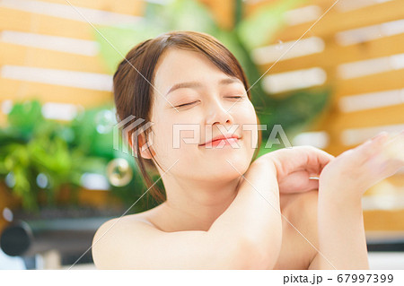 Woman, bathroom, relax Woman, bathroom, relax 67997399