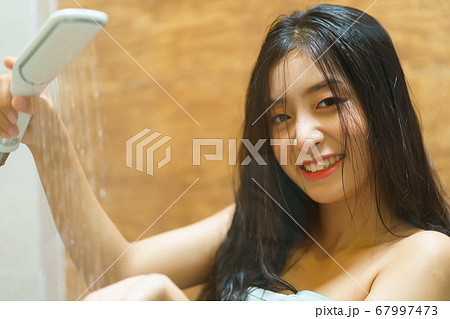 Woman, bathroom, relax Woman, bathroom, relax 67997473