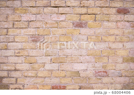 Background of old vintage brick wall wallcovering Background of old vintage brick wall wallcovering 68004406