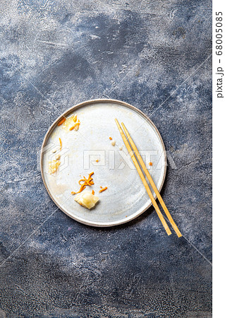 Empty dirty dish after korean kimchi with chopstick Empty dirty dish after korean kimchi with chopstick 68005085