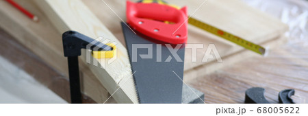 Workbench with wooden blocks and carpentry tools 68005622