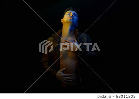 young Man. sexy Handsome Boy in color lights 68011805