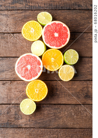 Fresh citruses on wooden table Fresh citruses on wooden table 68016202