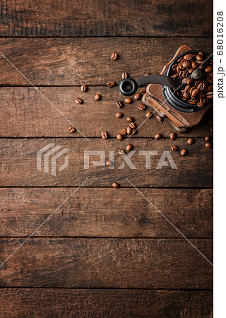 Old coffee grinder on wooden table with copyspace Old coffee grinder on wooden table with copyspace 68016208