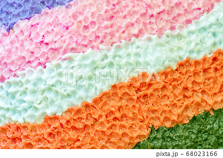 Close up to beautiful of various rough textures and colors of candles. Texture multicolor background. Selective focus. 68023166