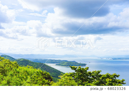 Beautiful scenery views of nature with a large reservoir above the Srinagarind Dam at Rai Ya Yam viewpoint in Si Sawat District, Kanchanaburi Thailand. Beautiful scenery views of nature with a large reservoir above the Srinagarind Dam at Rai Ya Yam viewpoint in Si Sawat District, Kanchanaburi Thailand. 68023326