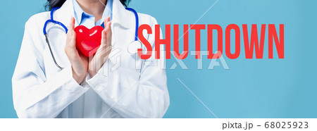 Shutdown theme with a doctor holding a heart Shutdown theme with a doctor holding a heart 68025923