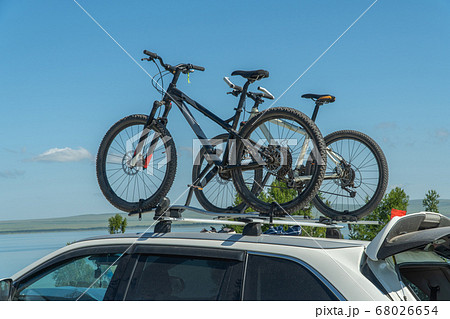 bicycles are attached to the trunk of the car. concept of active recreation. 68026654