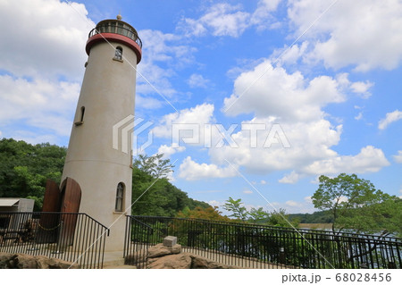 ムーミンバレーパークの灯台と青空の写真素材