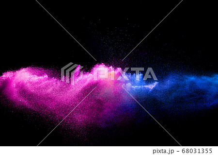 Pink blue dust particles splash on black background.Pink blue powder splash. Pink blue dust particles splash on black background.Pink blue powder splash. 68031355