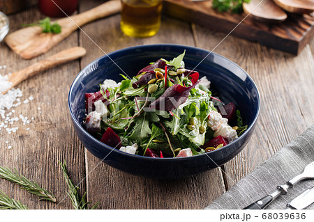 Healthy vitamin salad with beetroot cheese greens 68039636