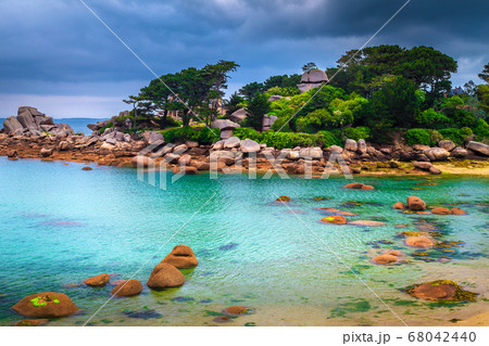 Picturesque Atlantic ocean coastline with turquoise bay, Perros-Guirec, France Picturesque Atlantic ocean coastline with turquoise bay, Perros-Guirec, France 68042440