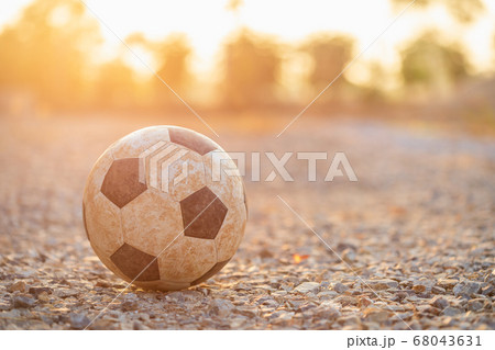 Old and dirty classic soccer ball at the 68043631