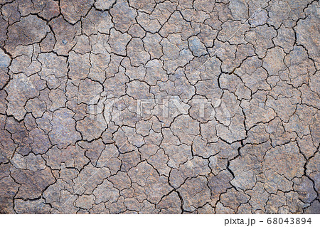 Grey dry soil or mud texture for background Grey dry soil or mud texture for background 68043894