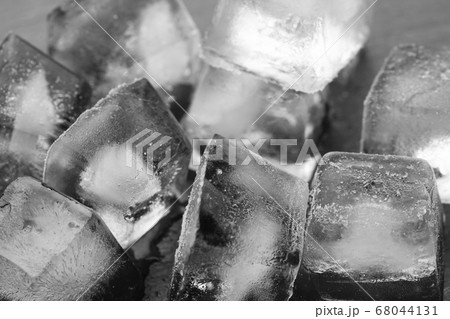 Ice cubes close-up on a black background. 68044131