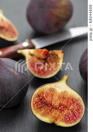 Fresh ripe figs in on a dark background. 68044606
