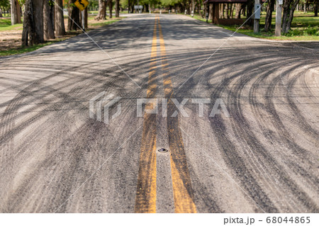 Stripe of car wheel from asphalt on the road in Stripe of car wheel from asphalt on the road in 68044865