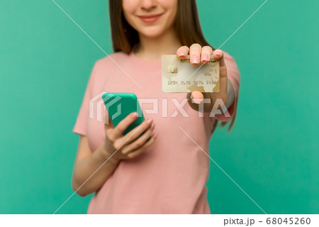 Photo of pleased happy screaming young woman 68045260