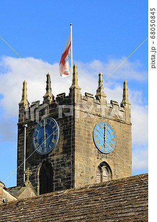 Haworth Church. The clock tower of St Michael and All Angels' Church in Haworth, West Yorkshire. Patrick Bronte, father of the Bronte sisters, served as a minister of the parish in the 19th century. 68050845