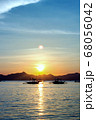 Beautiful sunset at the sea. a variety of colors and shades of the rising sun. 68056042