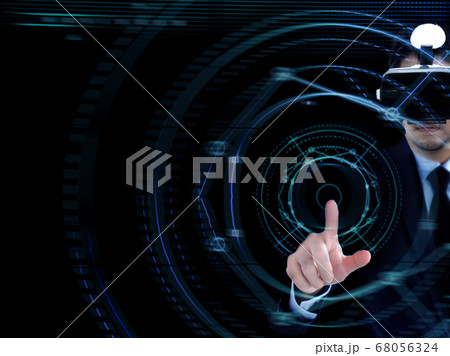 asian man with VR glass pointing on digital asian man with VR glass pointing on digital 68056324