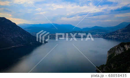 Aerial view over the Lake Lugano in Switzerland - evening view 68058435