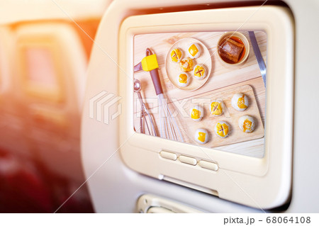 Aircraft monitor in front of passenger seat 68064108