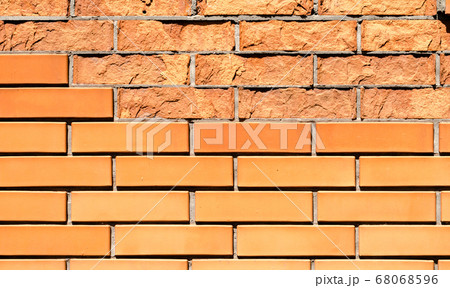 texture orange brick wall with damaged fragments texture orange brick wall with damaged fragments 68068596
