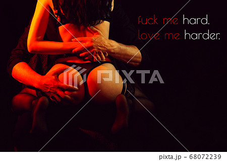 man firmly squeezes the hands of a sexy ass girl in underwear man firmly squeezes the hands of a sexy ass girl in underwear 68072239