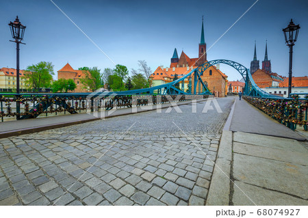 Tumski bridge over the Odra river in Wroclaw, Poland, Europe Tumski bridge over the Odra river in Wroclaw, Poland, Europe 68074927