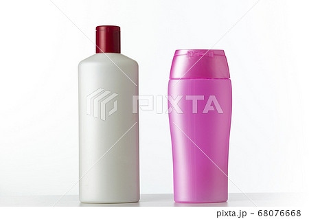 Two nameless plastic bottles white and pink from 68076668