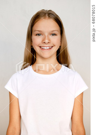 Portrait of teenager girl standing straight Portrait of teenager girl standing straight 68078015