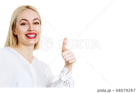 Portrait of beautiful adult woman in white blouse. Portrait of beautiful adult woman in white blouse. 68079267