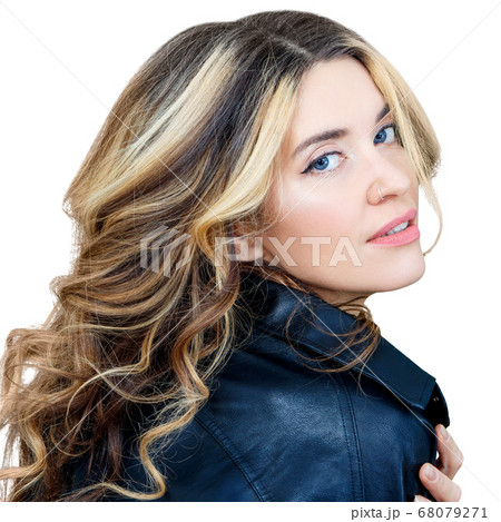 Stylish beautiful woman in black leather jacket and wavy hair. 68079271