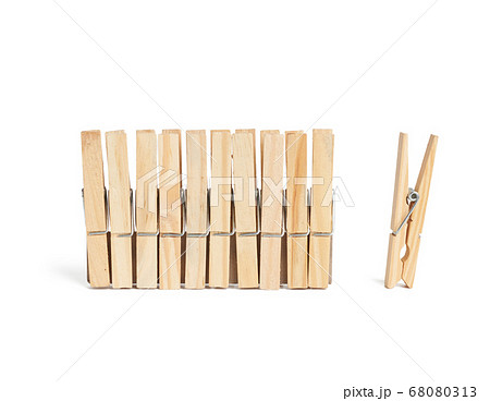 new wooden clothespins isolated on white new wooden clothespins isolated on white 68080313