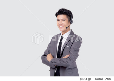 Portrait young asian business man call center wearing headset isolated on white background. Portrait young asian business man call center wearing headset isolated on white background. 68081260
