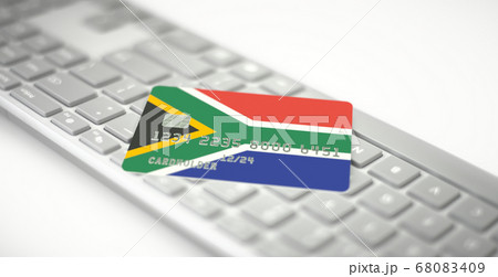 Plastic bank card depicting flag of South Africa on computer keyboard. Fictional numbers Plastic bank card depicting flag of South Africa on computer keyboard. Fictional numbers 68083409