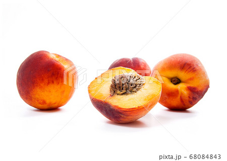 Group of ripe peach fruit and a half isolated on Group of ripe peach fruit and a half isolated on 68084843