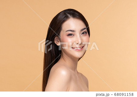 Beautiful Asian woman looking at camera smile with clean and fresh skin Happiness and cheerful with positive emotional,isolated on Beige background,Beauty Cosmetics and spa Facial treatment Concept Beautiful Asian woman looking at camera smile with clean and fresh skin Happiness and cheerful with positive emotional,isolated on Beige background,Beauty Cosmetics and spa Facial treatment Concept 68091158
