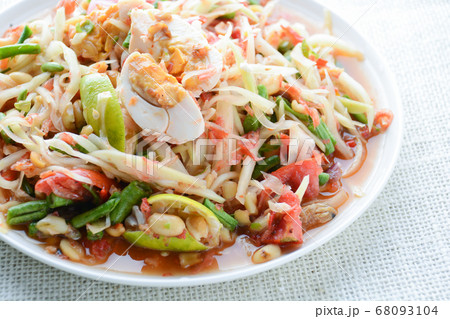 Papaya Salad with Satled Eggs, Pound chilies and Papaya Salad with Satled Eggs, Pound chilies and 68093104