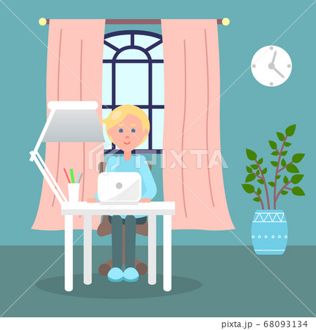 Young guy working at laptop sitting at table near window, distance work, isolation quarantine 68093134